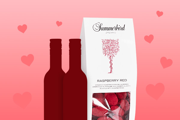 Valentinsdag-pakke med sjokolademandler og merlotvin