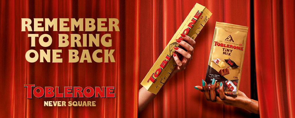 Toblerone-reklame med teksten: Husk å ta med en tilbake.